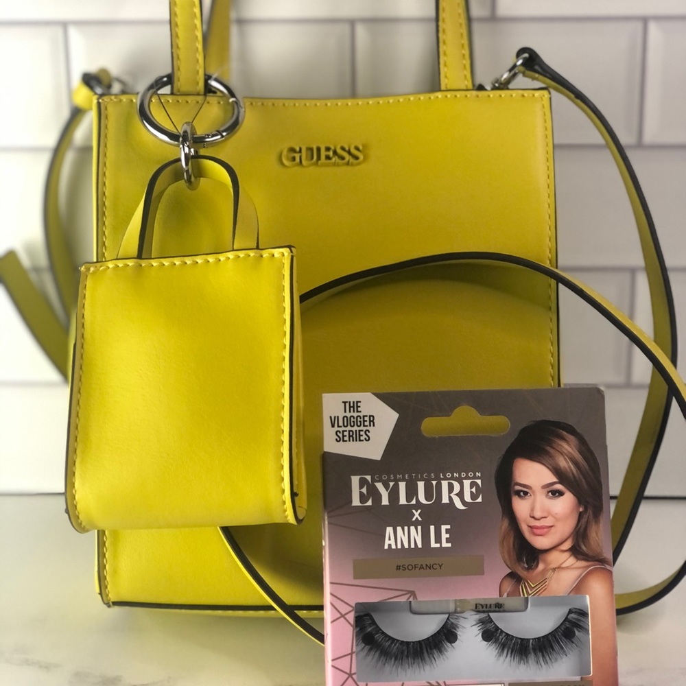 Yellow Guess Purse with Lashes